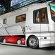 Illustration for article titled Luxury Caravan Has Sports Car Parking Dock In Its Belly